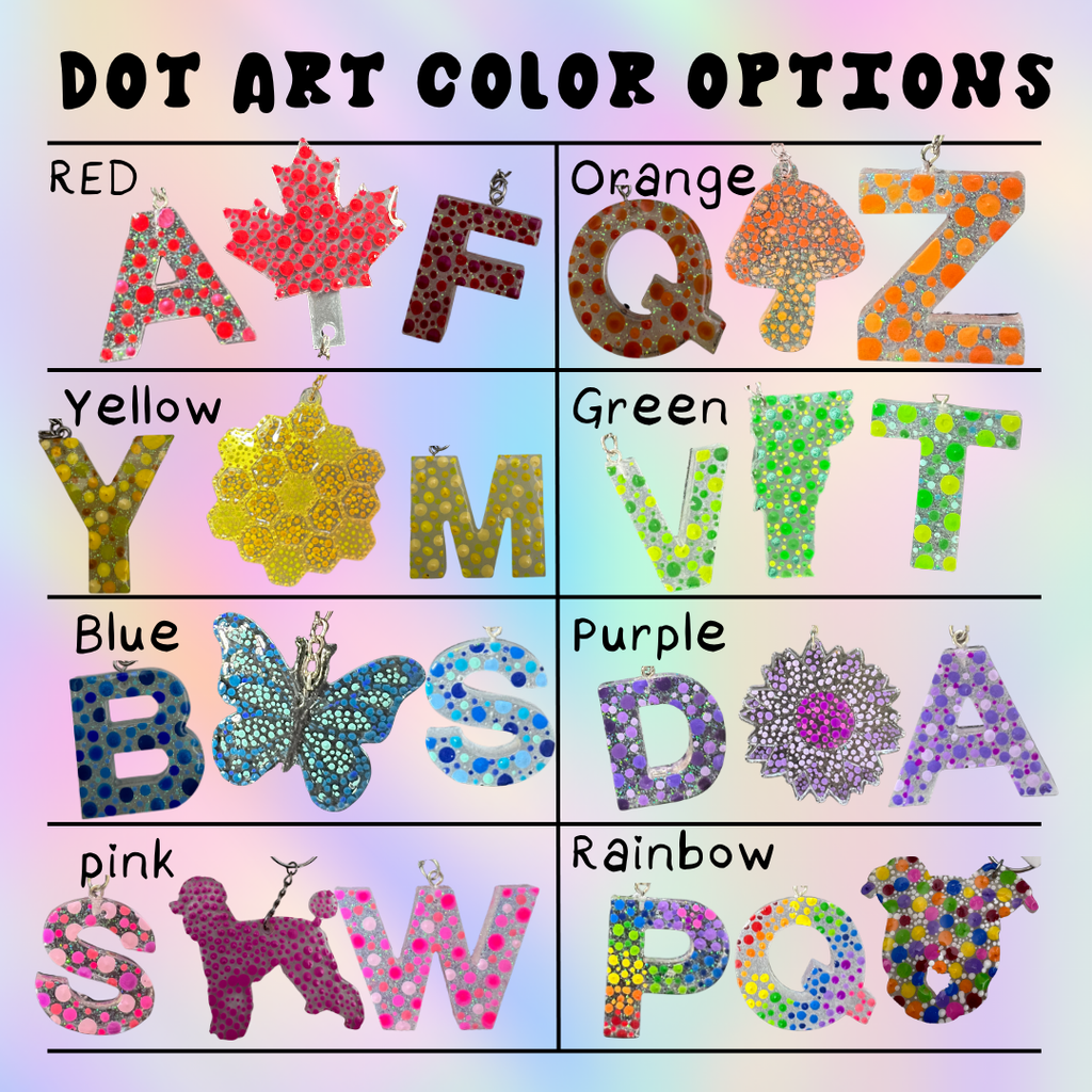 A color-options chart titled 'DOT ART COLOR OPTIONS' showing decorative alphabet letters arranged in a grid with labeled color names: Red, Orange, Yellow, Green, Blue, Purple, Pink, and Rainbow. Each letter is filled with different dot patterns and small hanging loops at the top.