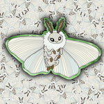 A die-cut enamel pin or sticker featuring a cute cartoon moth with large white wings, a fuzzy cream body, brown antennae, and a green outline, shown against a repeating patterned background of similar moths.