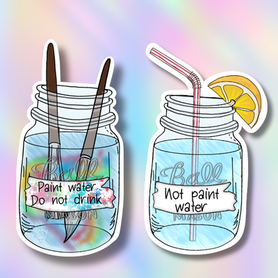Two die-cut vinyl stickers featuring illustrated mason jars with straws and paintbrushes, shown on a pastel rainbow gradient background. The left sticker says 'Paint water.