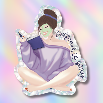 A die-cut sticker featuring an illustration of a woman with a green face mask and a purple wrap, holding a phone and a book, with the text 'selfcare is messy' written on the right side, set against a pastel rainbow gradient background.