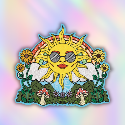 A colorful zendoodle die-cut sticker featuring a cartoon sun wearing sunglasses, surrounded by sunflowers, clouds, green leaves, and red-and-white mushrooms, set against a pastel iridescent background.