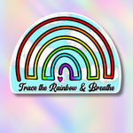 A die-cut sticker featuring a stylized rainbow with the text 'Trace the Rainbow & Breathe' on a pastel rainbow gradient background.
