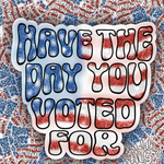 A die-cut sticker with the text 'HAVE THE DAY YOU VOTED FOR' in bold bubble letters filled with a red, white, and blue glittery American flag pattern, shown against a busy matching background.